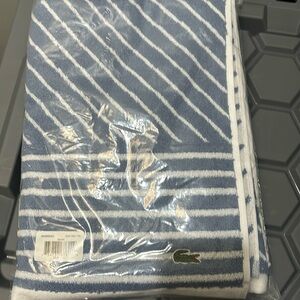 Lacoste Bath Towel – Soft & Absorbent – Luxury Bathroom Essential